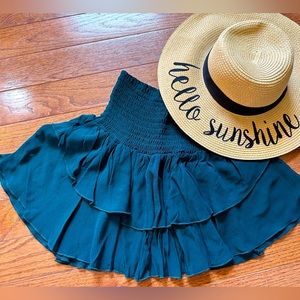 NanaMacs hunter green smocked mini skirt